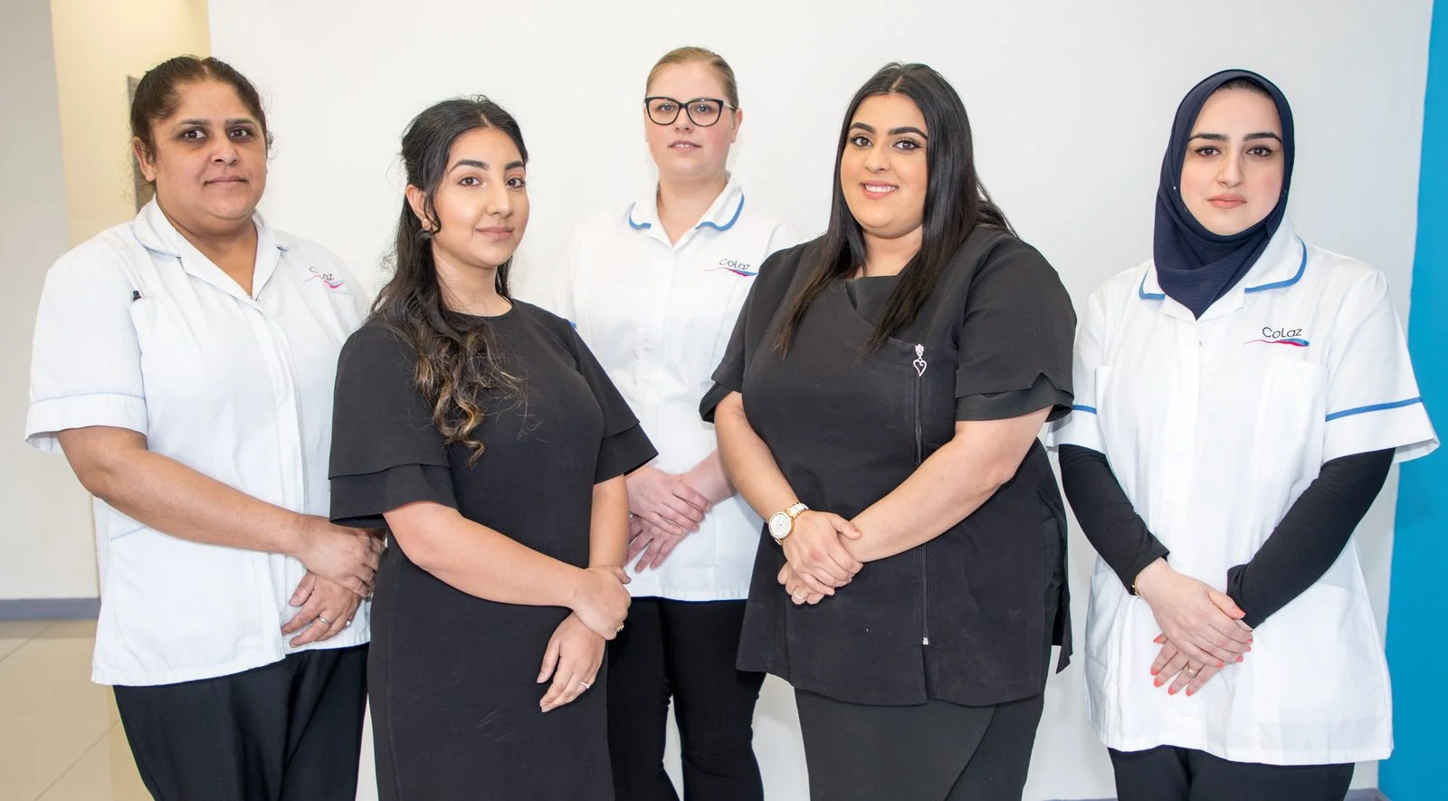 Five qualified clinicians of the CoLaz Hounslow team in branded uniform