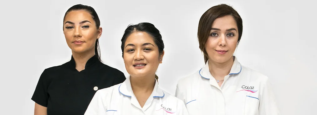 Three qualified clinicians of the CoLaz Reading team in branded uniform