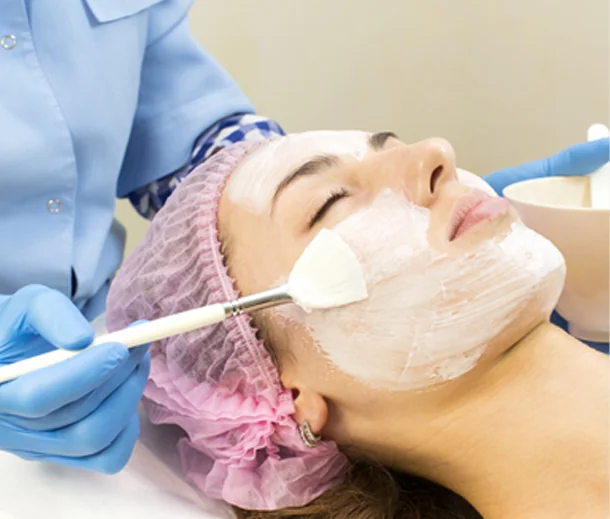 CoLaz therapist performing a deep cleanse facial with gentle massage