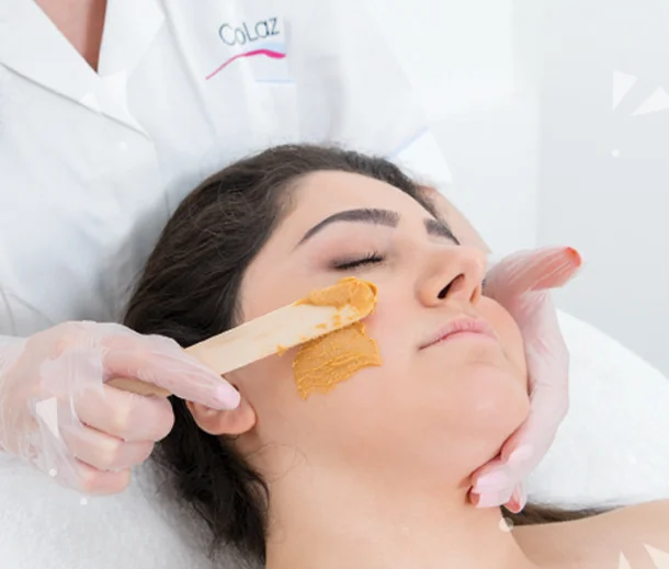 Steam, mask and serums laid out for a deep cleanse facial at CoLaz