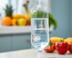 An IV bag beside fresh fruits and vegetables on a white clinic countertop.